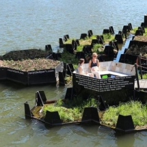In Rotterdam, a floating green park made entirely from recycled plastic found in the harbor has been developed by the Recycled Island Foundation. The park serves as a green space for people and a home for nature, including fish and birds.